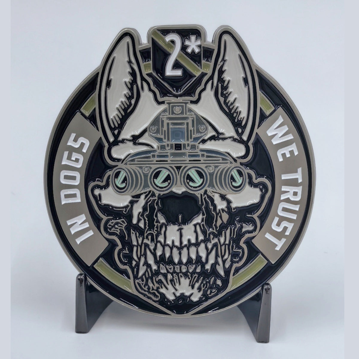 In Dogs We Trust challenge coin, military working dog side — thin green line, skull in helmet with night vision goggles, framed by working dog ears.